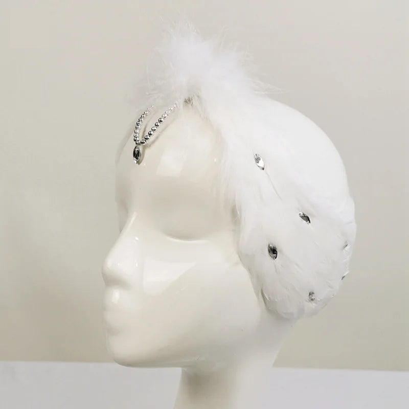 The Ottilie Swan Lake Headpiece crystal feather