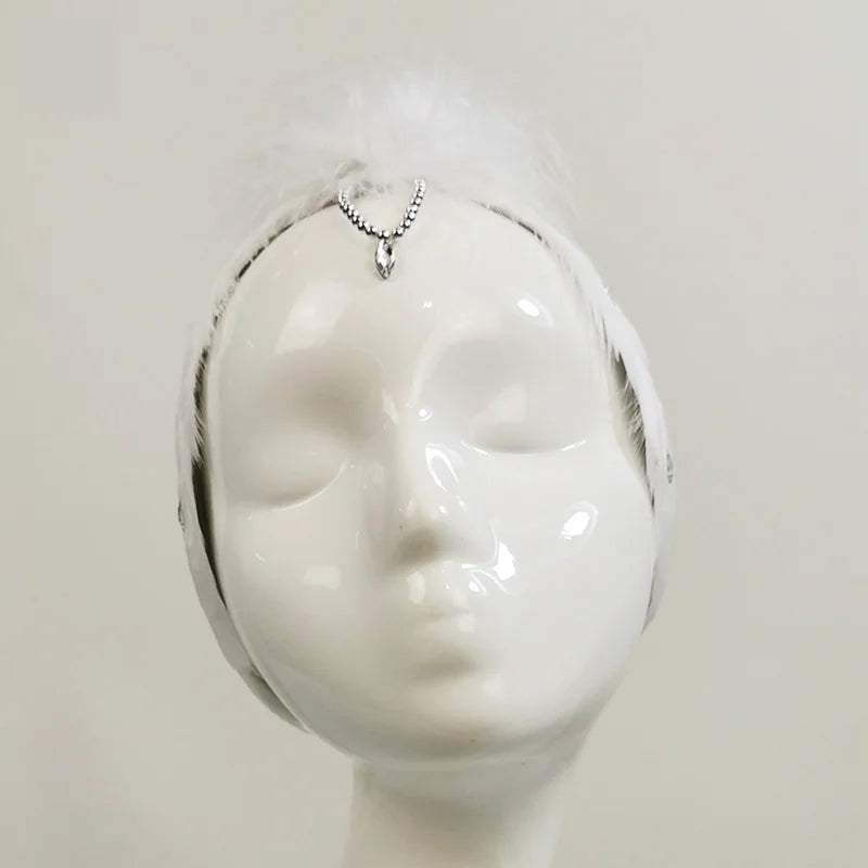The Ottilie Swan Lake Headpiece crystal feather