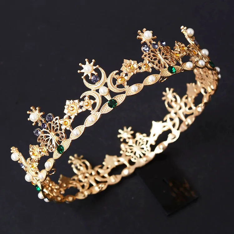 gold crown with faux emeralds pearls and crystal