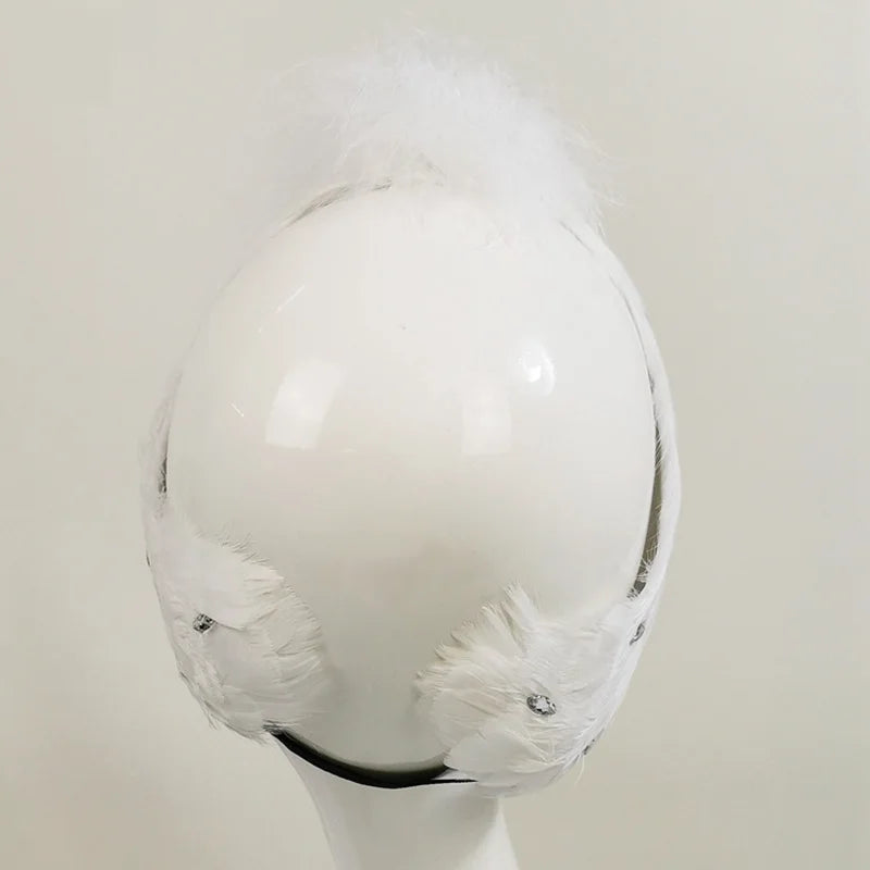 The Ottilie Swan Lake Headpiece crystal feather