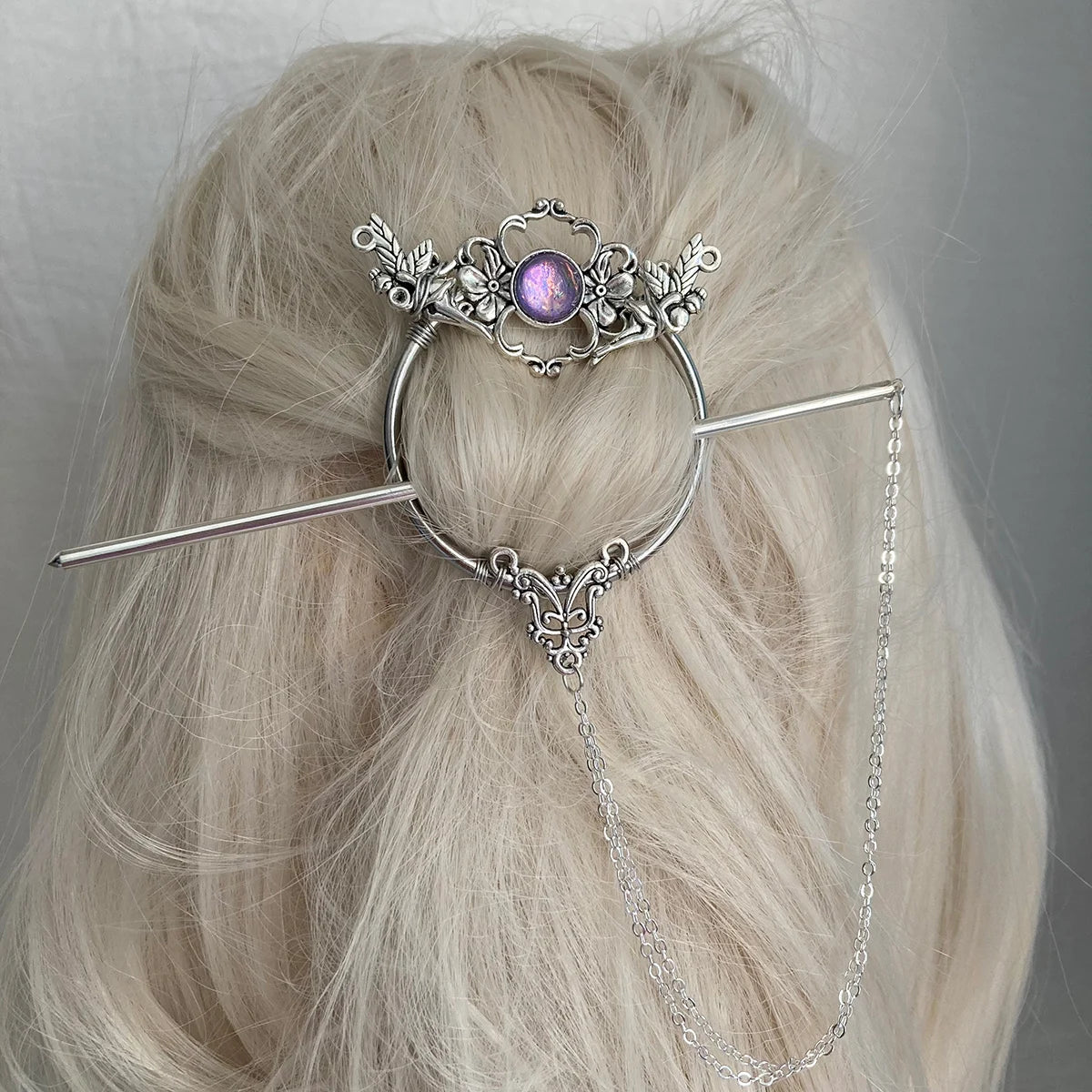 metal stick pin bun holder with pink crystal