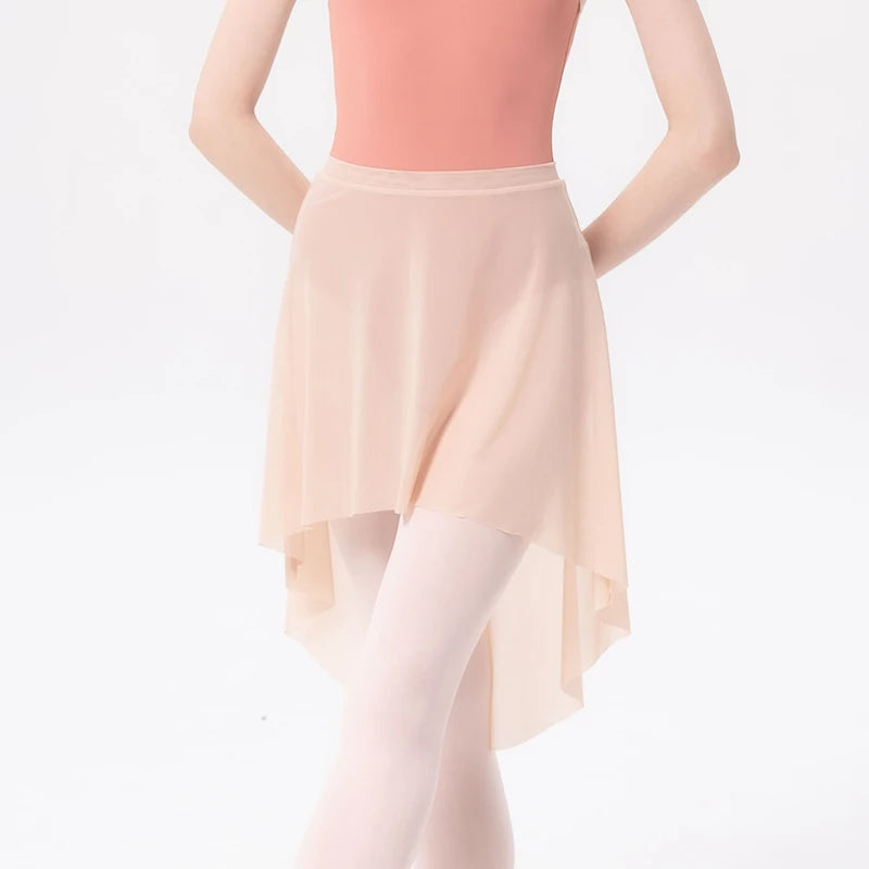 front of woman wearing a beige mesh ballet skirt