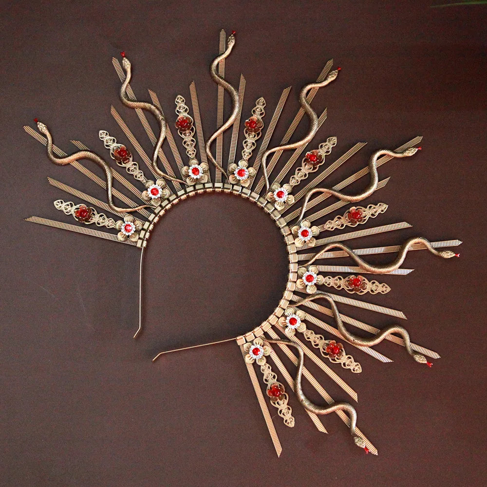 Gold medusa snake headpiece with white and gold flowers