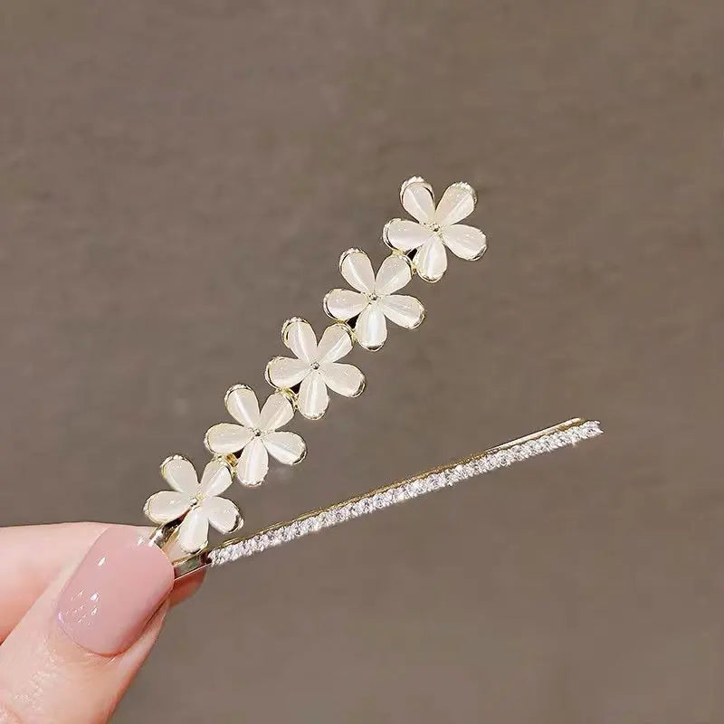 The Min-Ji Floral Bobby Pins white and silver