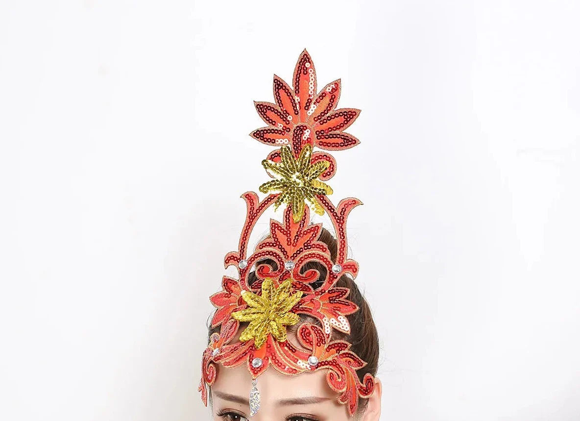 front of woman wearing a silver sequined ballet headpiece