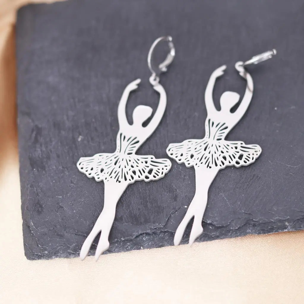 a pair of stainless steel ballerina earrings