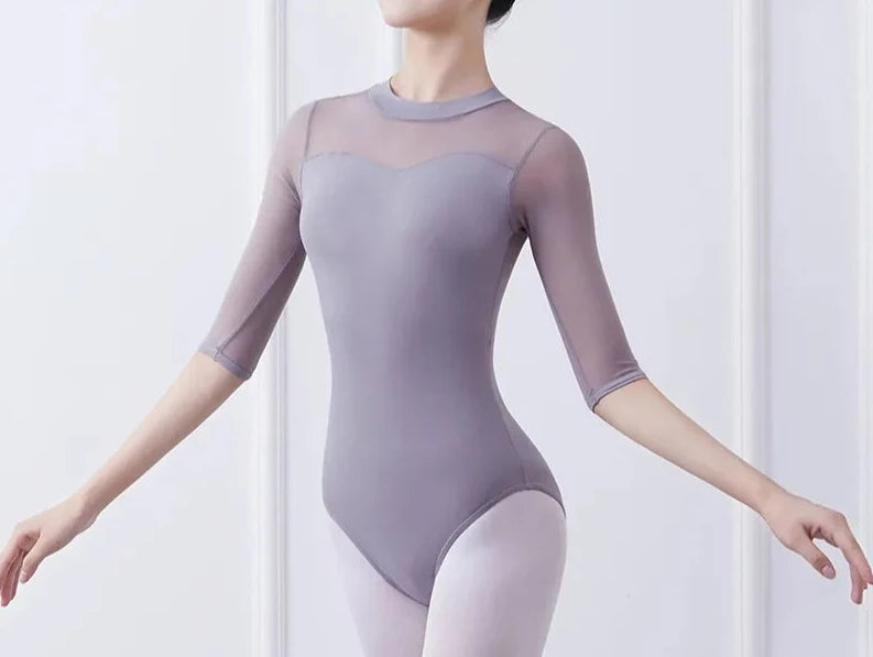 woman wearing 3/4 sleeve grey mesh leotard