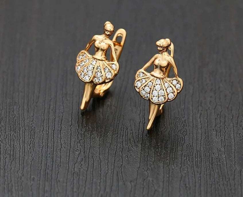A pair of copper and rhinestone ballerina earrings