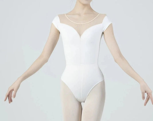 ballerina wearing  a white plunge neck leotard
