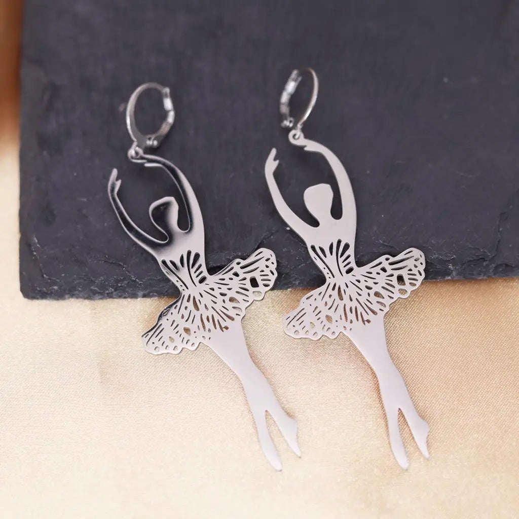 a pair of stainless steel ballerina earrings