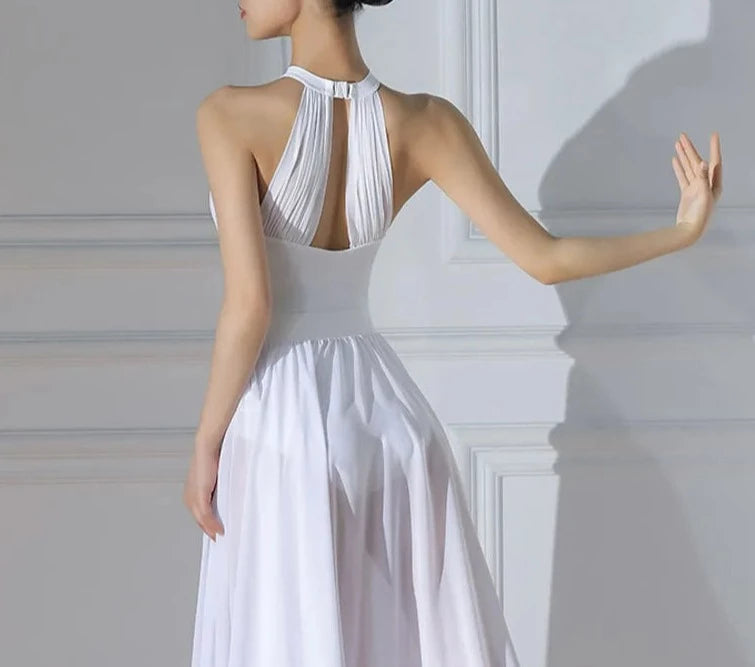 Back of ballet dancer wearing a white halter leotard