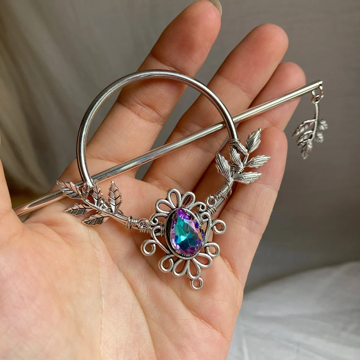 metal stick pin bun holder with borealis crystal