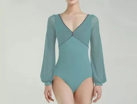 woman wearing a foam green long sleeve bodysuit leotard