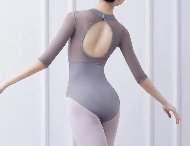 back of woman wearing 3/4 sleeve mesh leotard