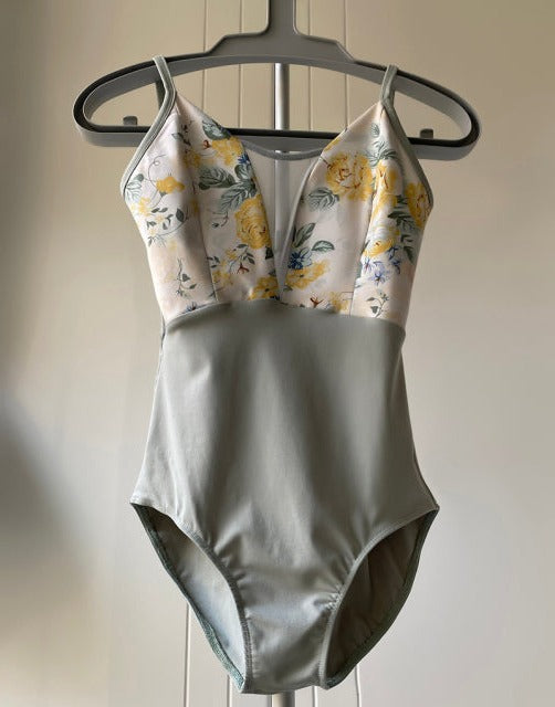 front of grey and yellow camisole leotard with floral contrast