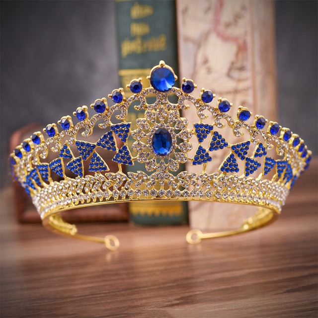front of sapphire blue gold tiara with rhinestones. YAGP