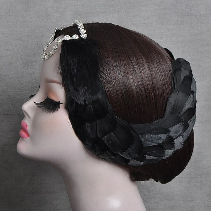 side of mannequiin wearing a black swan ballet headpiece