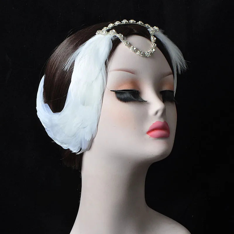 front of mannequin wearing a white swan headpiece