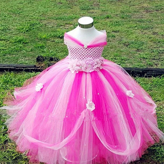Pink princess dress with a flower belt and flowers on skirt