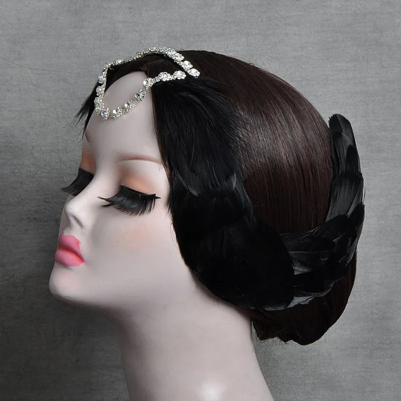 side of mannequin wearing a black swan ballet headpiece