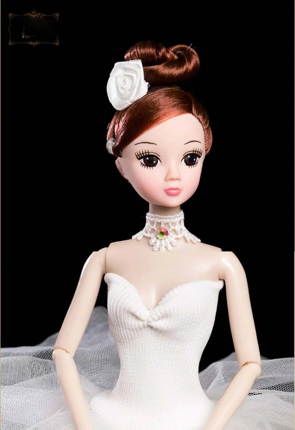 Front of ballerina doll with white tutu