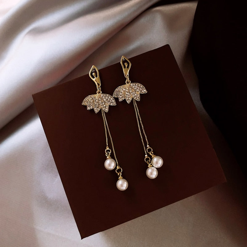 Rhinestone and faux pearl ballerina drop earrings