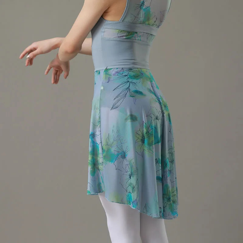 back of woman wearing blue and green floral ballet skirt