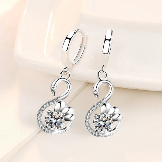 Pair of silver swan earrings with cubic zirconia