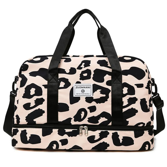 front of black and pink dance bag sports bag
