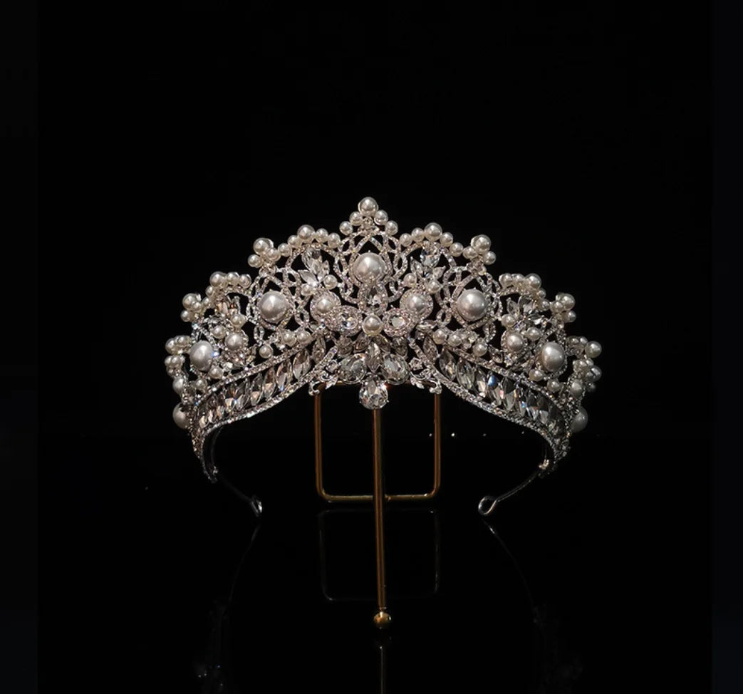 front of crystal and pearl tiara