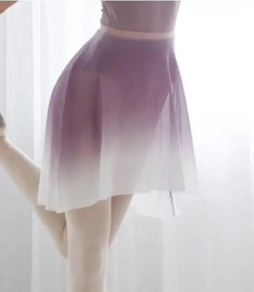 woman wearing pink gradient colored ballet skirt