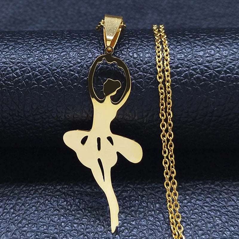 Gold tone ballerina pendant necklace