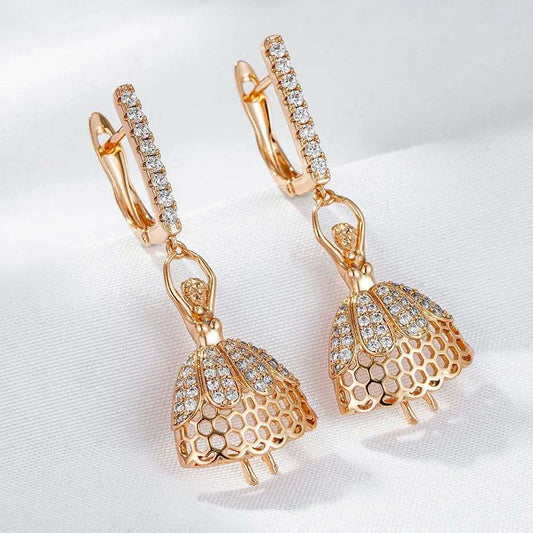Gold tone stud ballerina earrings with rhinestone