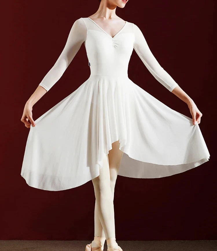 Woman wearing off white ballet dress
