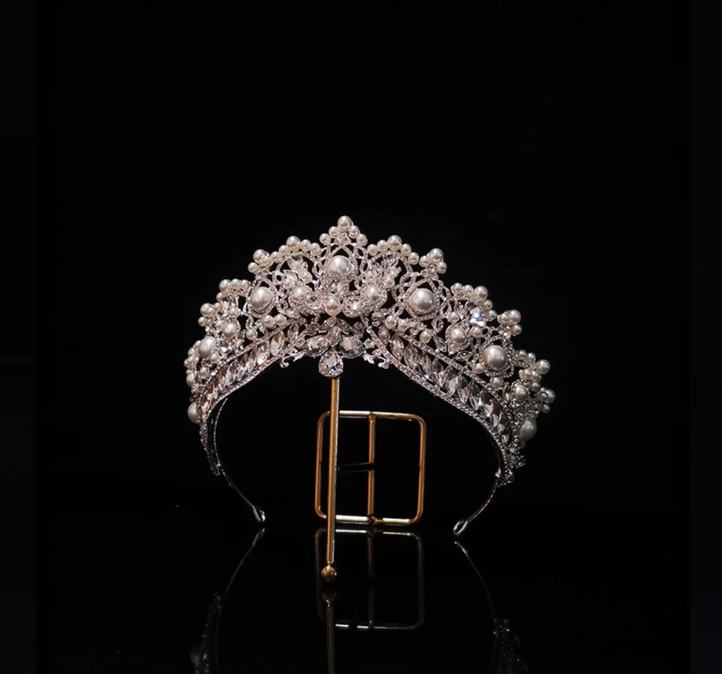 front of crystal and pearl tiara