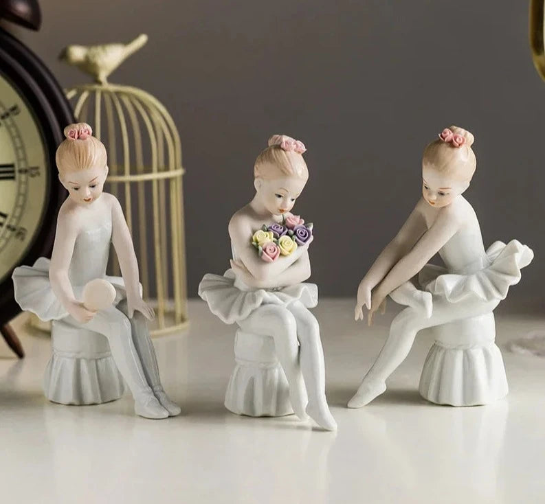 three ceramic ballerina figurines
