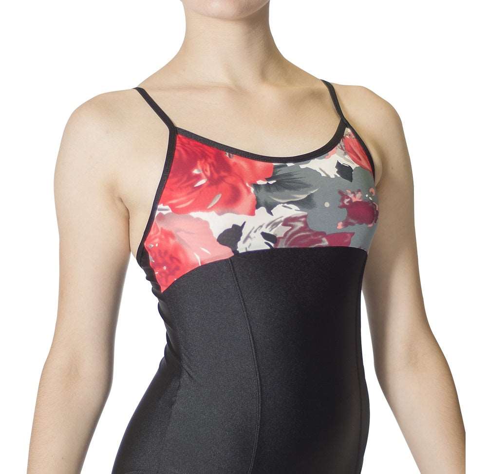 front of woman wearing black and floral camisole leotard
