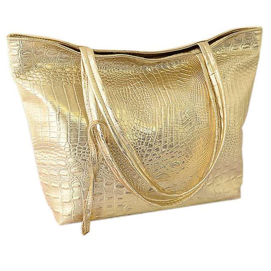 Handtasche und Tanztasche aus goldenem Alligatorleder