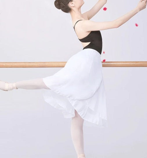 woman wearing white two layered ballet skirt