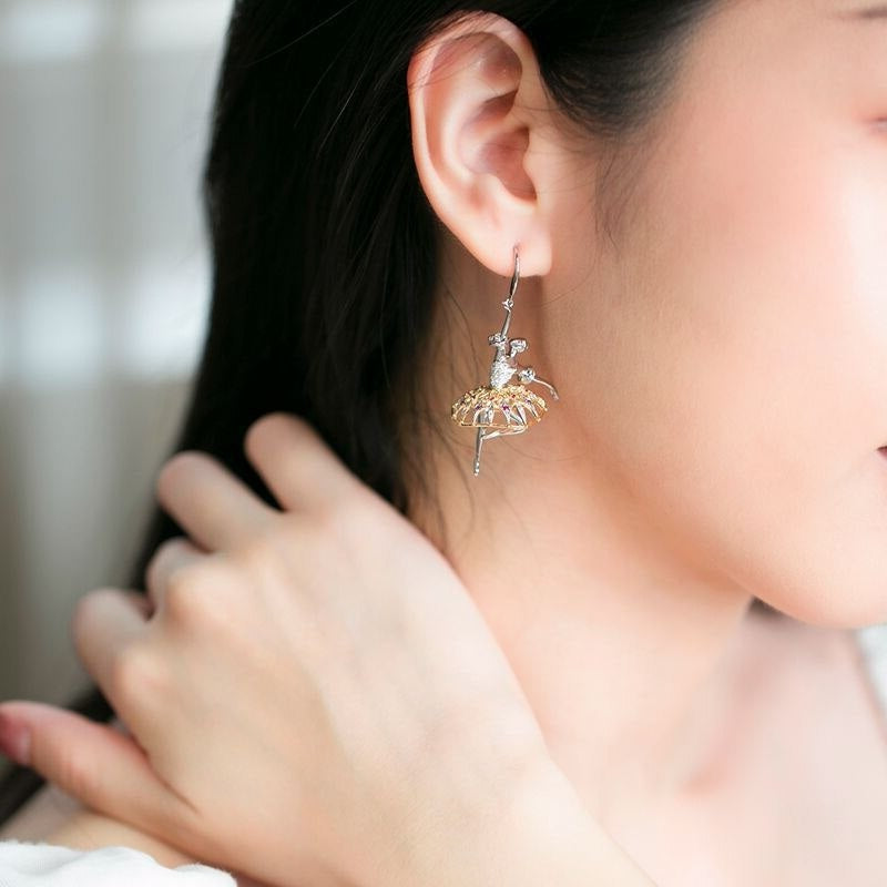 woman wearing silver ballerina earring with crystals