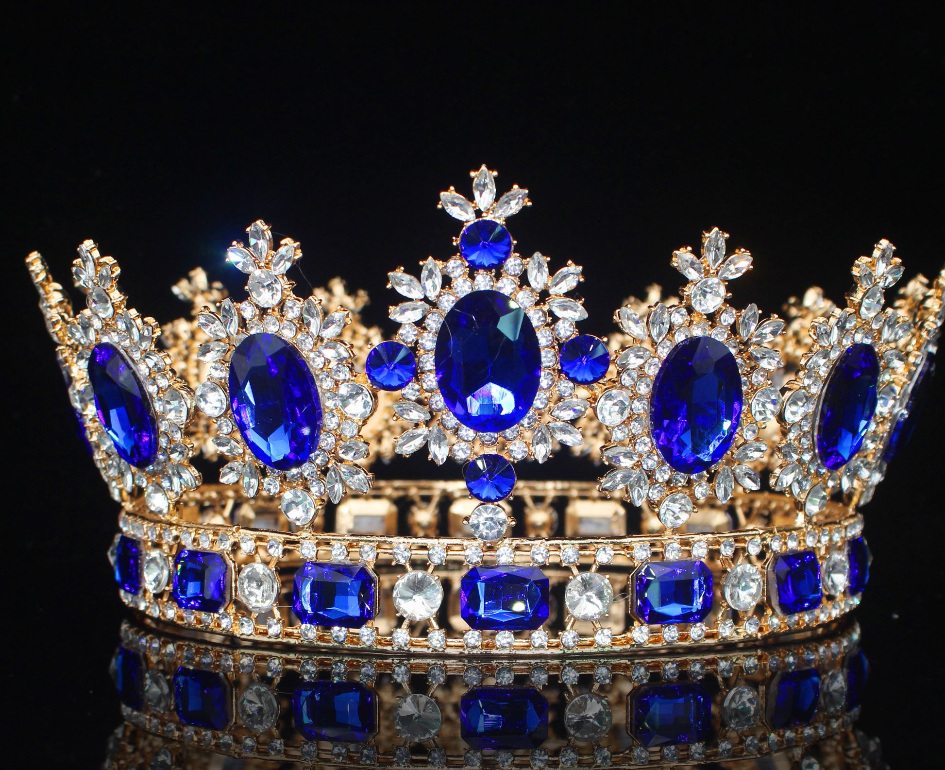front of sapphire blue crystal crown. YAGP