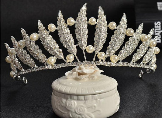 front of feather, pearl and rhinestone tiara for ballet or wedding