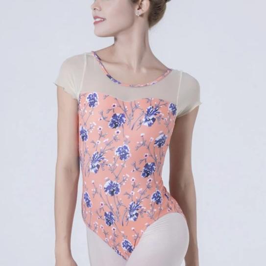 front of woman wearing pink floral leotard ballet and dance
