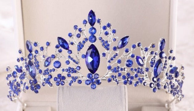 front of silver and sapphire blue crystal tiara