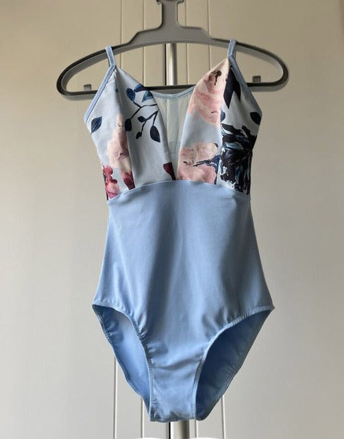 front of blue and floral camisole leotard
