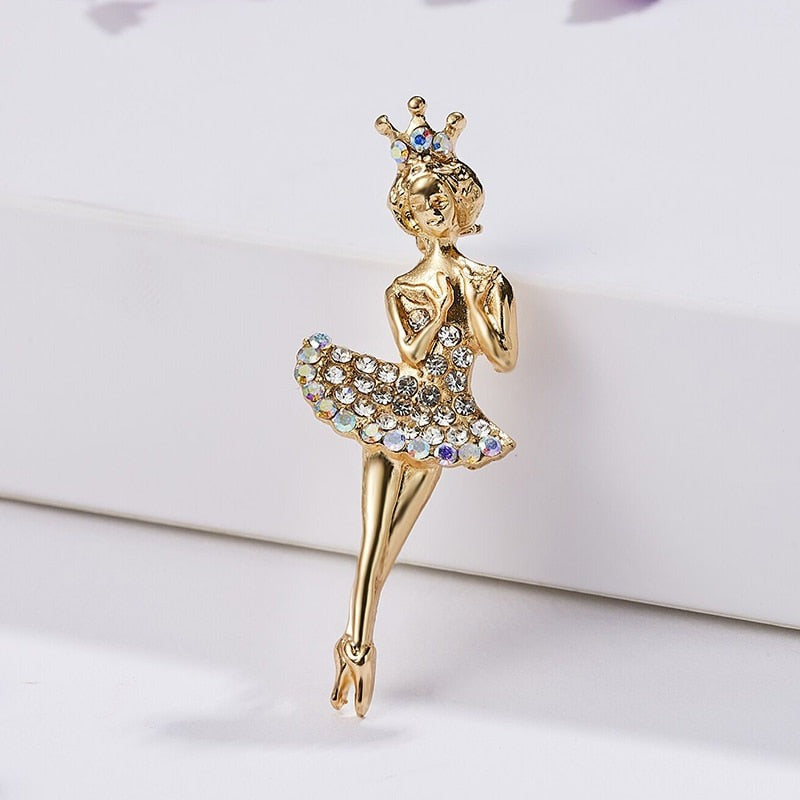 Front of gold tone ballerina pin with rhinestones YAGP