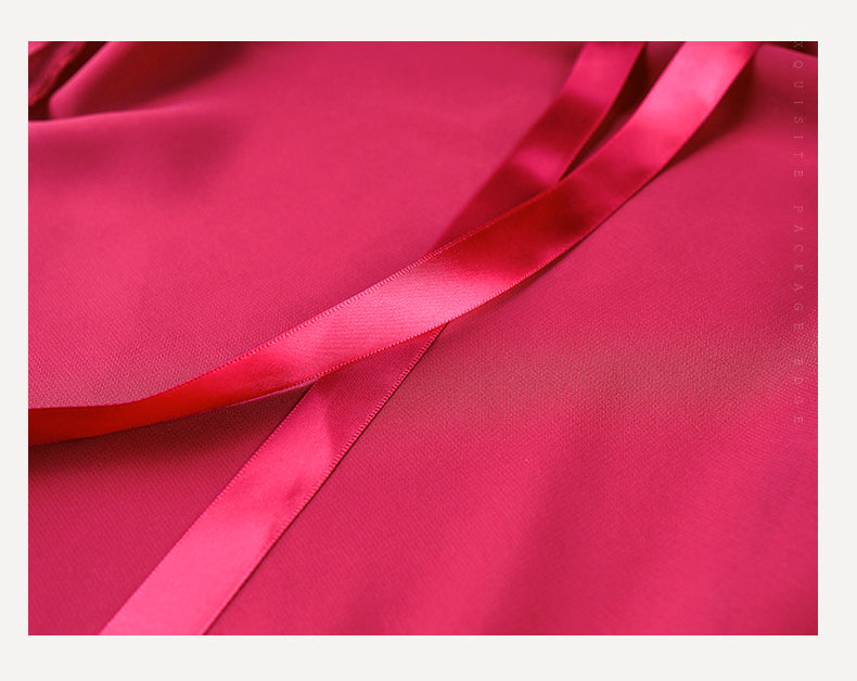 close up of red ballet skirt with ribbon