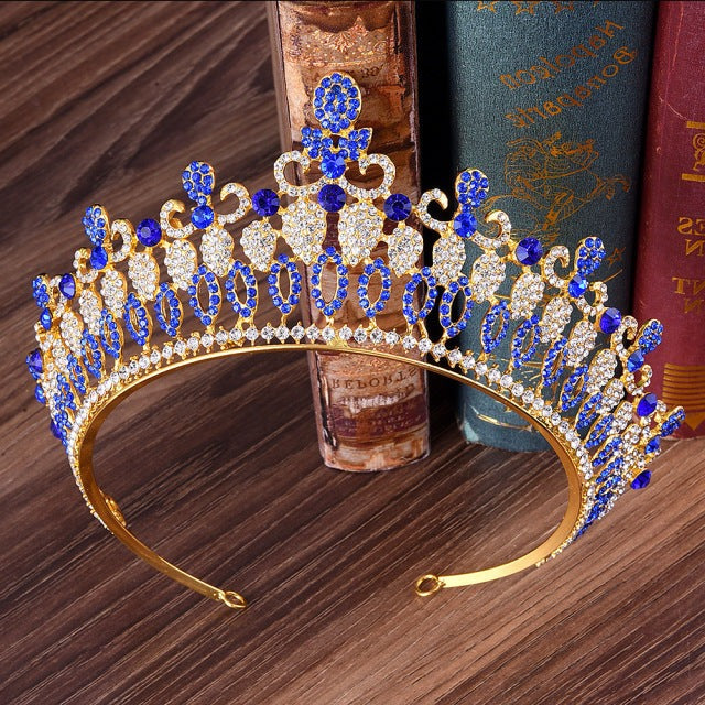 Gold tiara with sapphire blue rhinestones