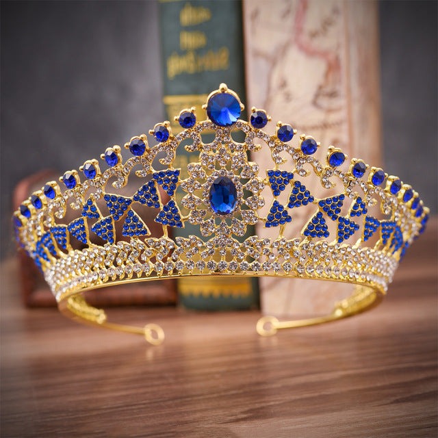 front of sapphire blue gold tiara with rhinestones. YAGP