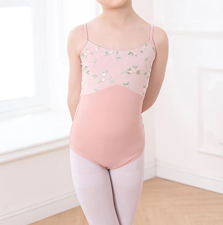 front of girl's pink and floral camisole leotard